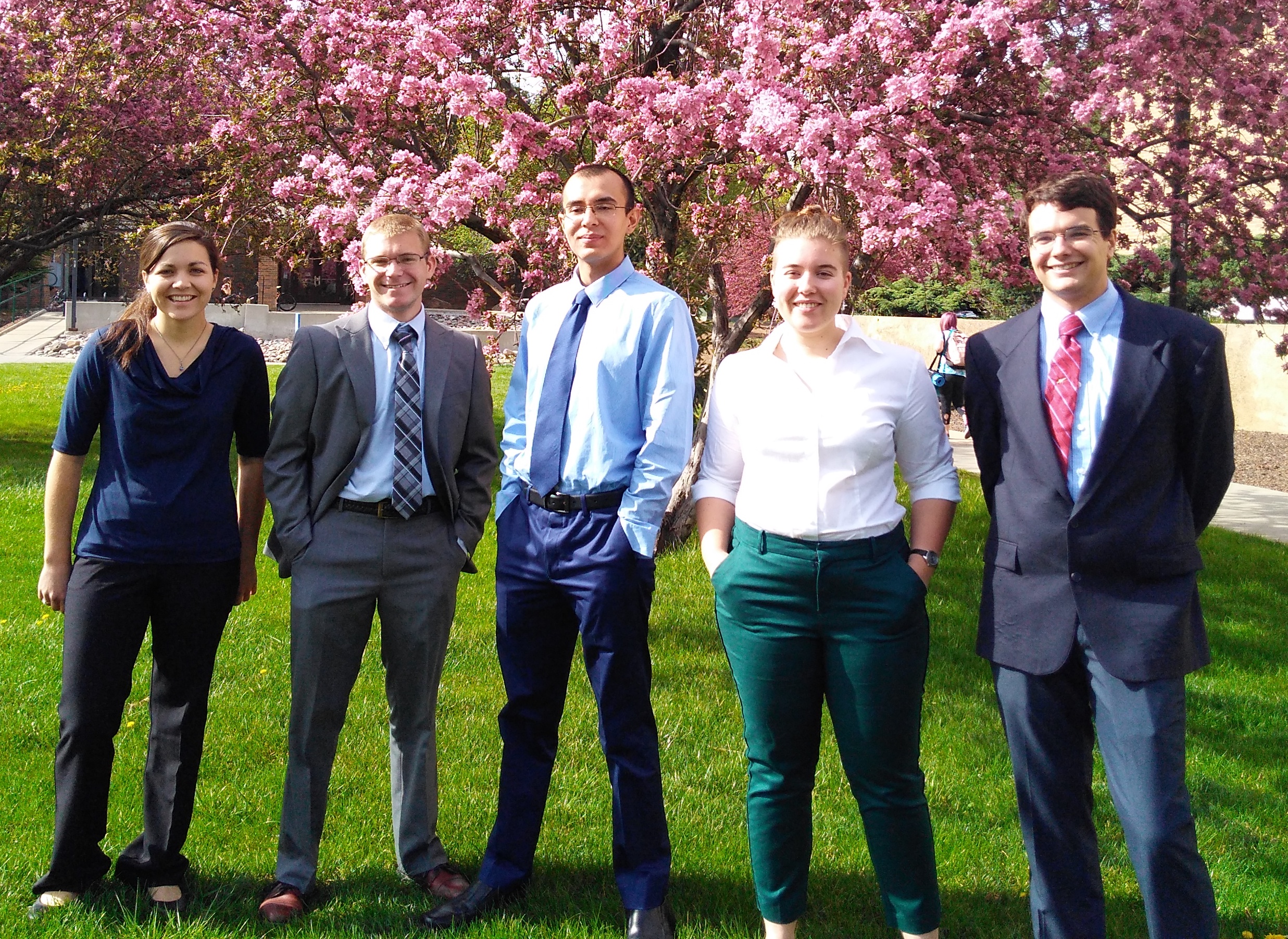 A photo of our lovely team, Hannah Rentschler, Ethan Michel, Brandon Begay, Azalea Grant, and Robert Libby right after the UGRAD Symposium final presentation. We thought the flowers were pretty.