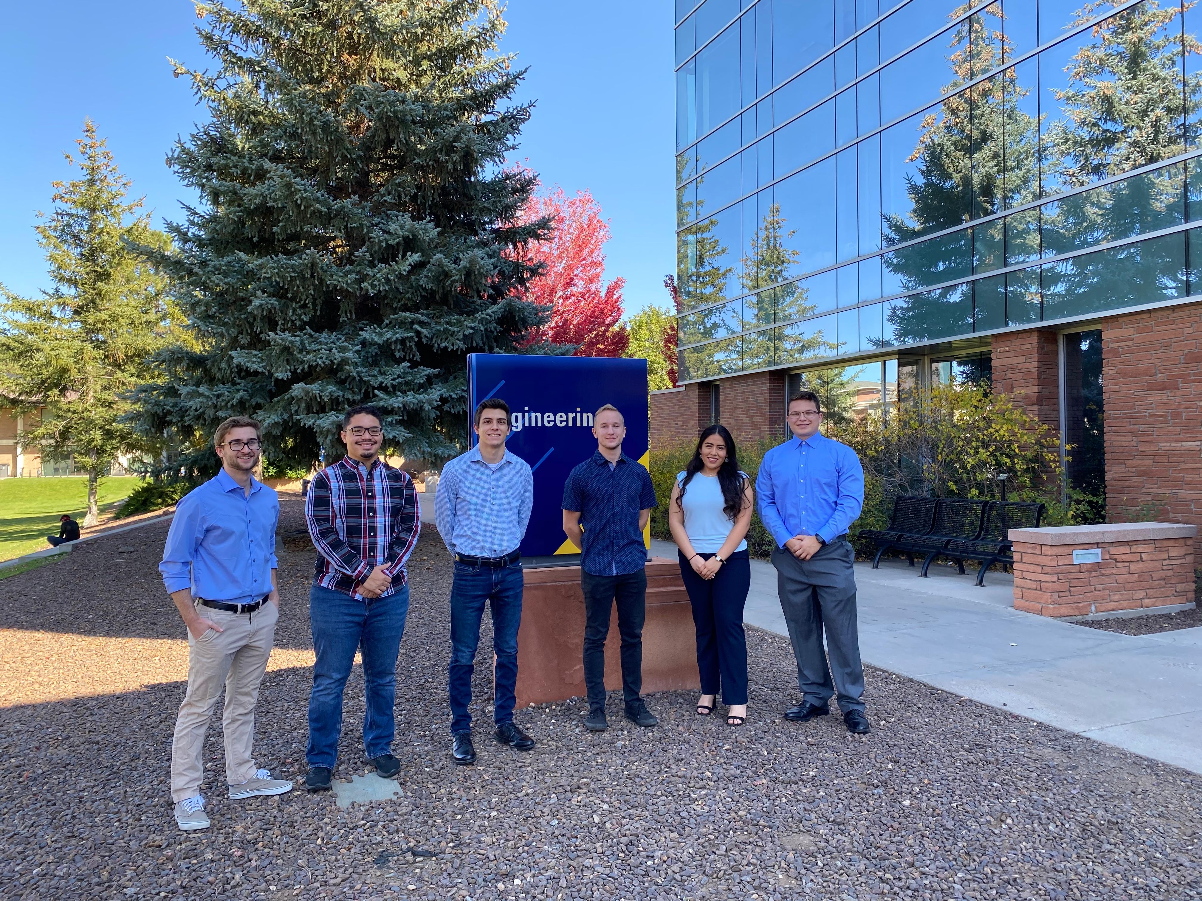 6 member team picture in front of NAU engineering building.